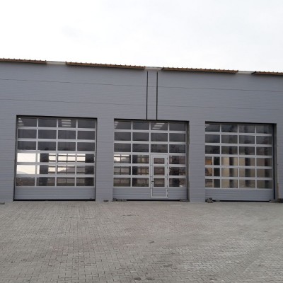 SABITERM Usi de garaj sectionale - Usi de garaj sectionale industriale pentru depozite, fabrici, hale SABITERM