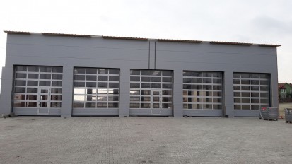 Usi de garaj sectionale Usi de garaj sectionale industriale pentru depozite, fabrici, hale