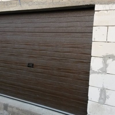SABITERM Usi de garaj sectionale - Usi de garaj sectionale industriale pentru depozite, fabrici, hale SABITERM