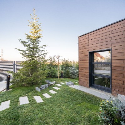 ABET LAMINATI Placare fatada casa HPL compact imitatie lemn MEG - Panouri din HPL compact pentru