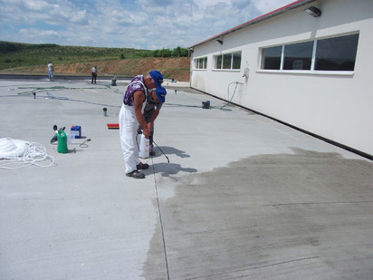 Acoperis din beton tratat prin pulverizare Acoperis din beton tratat prin pulverizare