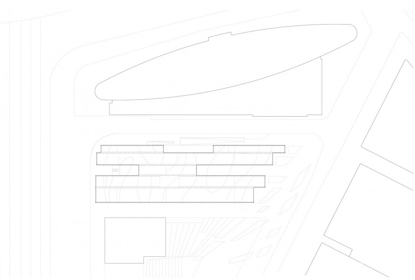 Gradinita Origami - planuri - Un acoperis verde intre doua cladiri de birouri mascheaza spatiile unei