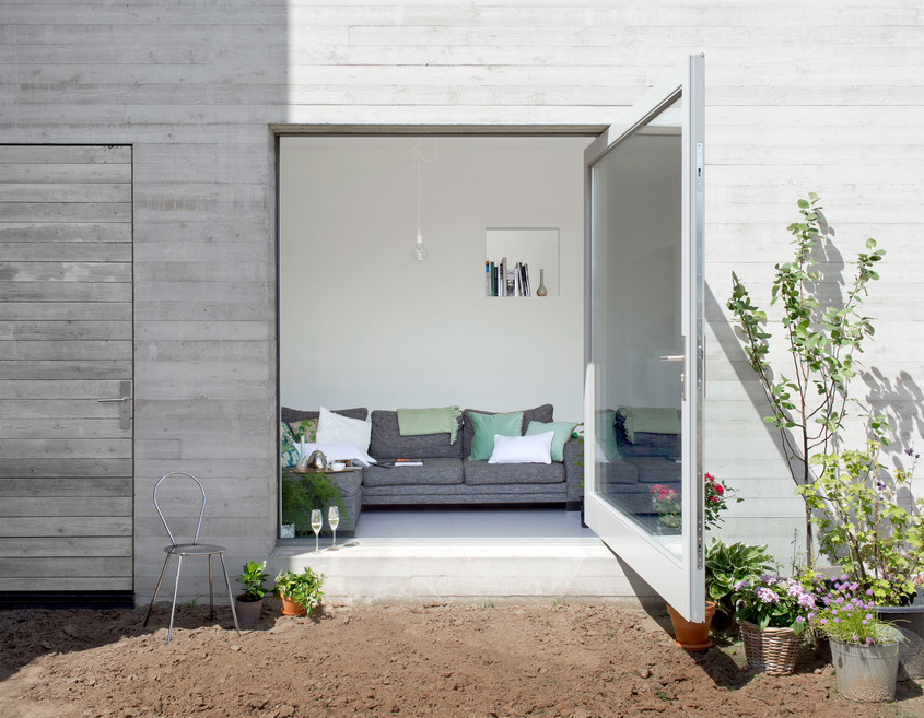 Casa Deventer  - Casa eficienta organizata intr-un cub de beton