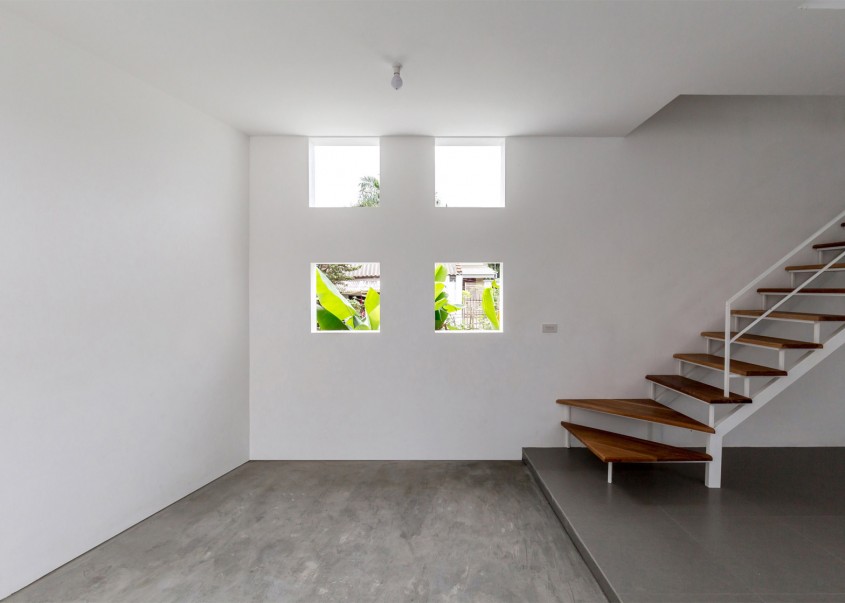 Locuinta Cul-de-sac - O casa ingusta are totusi interioare luminoase si confortabile