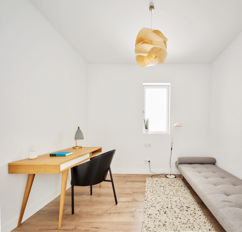 Un apartament amenajat cu granit gri și ziduri albe stălucitoare - Un apartament amenajat cu granit