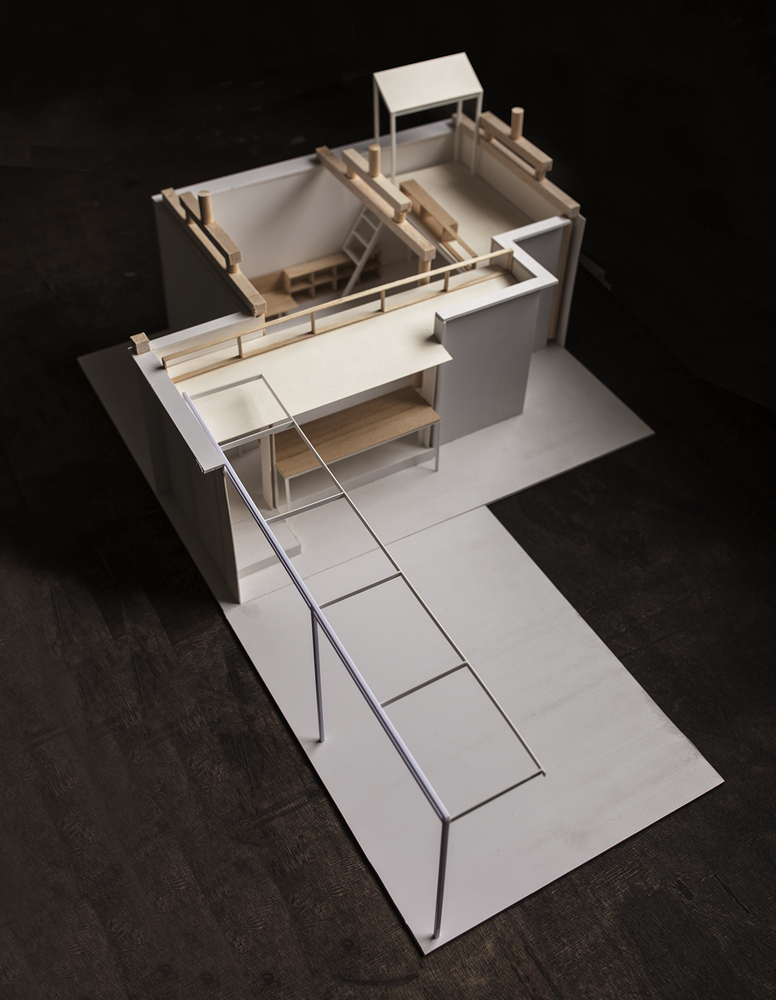 Un spatiu minimal reconfigurat pentru a functiona ca o casa - Un spatiu minimal reconfigurat pentru