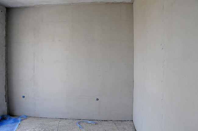 Soluția CORKLINE pentru izolarea fonică a pereților între apartamente cu plăci din plută expandată