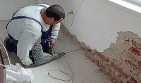 Eliminarea igrasiei la o casă construită din cărămidă afectată de umezeală, în Râmnicu Vâlcea