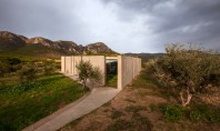 O casă din beton își deschide interioarele spre munți Aceasta locuinta din beton construita de echipa