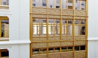 Fatada cu elemente din lemn design modern pentru o cladire din sec al XIX-lea Biroul de