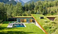 O casă acoperită cu pământ şi vegetaţie pentru un plus de eficienţă Arhitectii au creat o