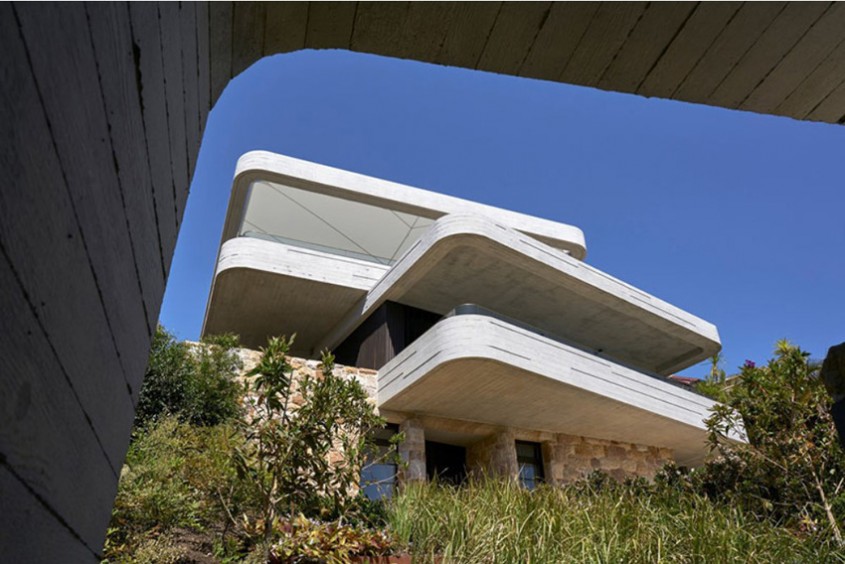 Casa cu un design inspirat dintr-un morman de cărți