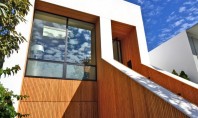 O noua estetica arhitecturala pentru o casa veche Echipele de specialisti M-Projects si Larson Shores Architecture