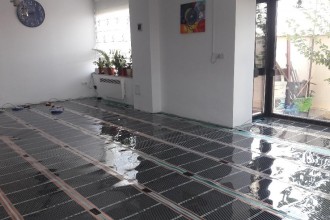 Sistem de încălzire în pardoseală cu folie carbonică încălzitoare