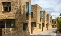 Cutii de sticlă animează fațadele acestor case londoneze Proprietarul terenului un dezvoltator imobiliar local a cerut