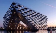 Un nou reper arhitectural în Amsterdam: Clădirea de pe lac cu propriul său port 