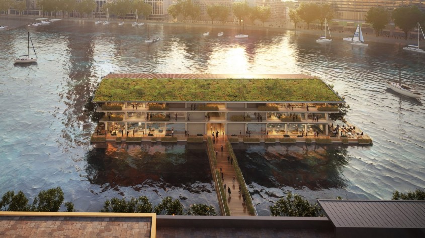 O clădire de birouri plutitoare complet off-grid este construită pe un râu din Europa