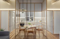 Un apartament remodelat cu ajutorul partițiilor din sticlă și al grinzilor din beton