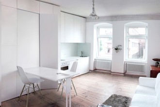 Un apartament mic mai spațios datorită mobilierului mascat &icirc;n pereți