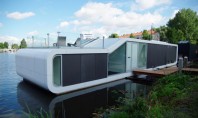 Biroul +31 Architects finalizeaza o locuinta plutitoare pe raul Amstel